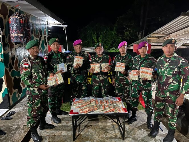 
					Satgas Pamtas Yonarmed 11 Kostrad bersama Satgasmar Ambalat XXX mengamankan kosmetik illegal asal Malaysia,