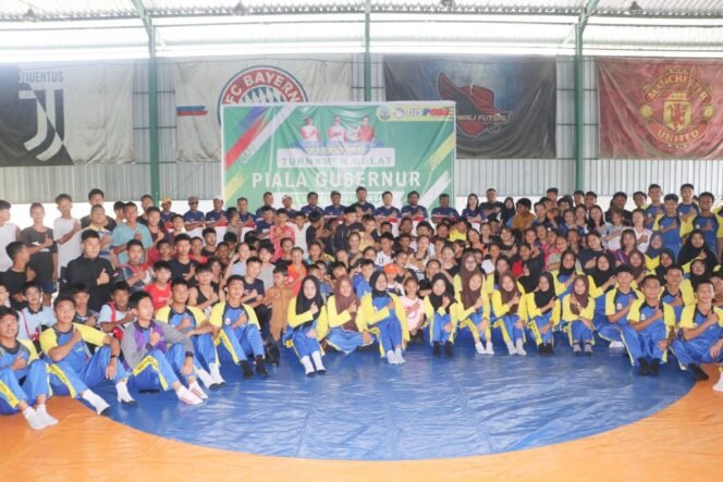 
					Kepala Dinas Pemuda dan Olahraga (Dispora) Kaltara Ir. Yosua Batara Payangan, S.T, M.T., membuka turnament Gulat Piala Gubernur Kaltara, di Lapangan Futsal Rajawali, Tanjung Selor, Minggu (15/12/2024).