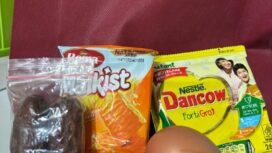 Menu MBG versi Ramadhan 1446 H di Nunukan, Kaltara. Biskuit, kurma, telur rebus, jeruk dan susu bubuk sachet,