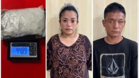 Sepasang suami istri yang diamankan Satreskoba Nunukan di dermaga Aji Putri. Keduanya membawa 44 gram sabu sabu dari Malaysia.