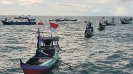 Antusiasme para nelayan perbatasan RI mengikuti upacara HUT 80 RI di Karang Unarang.