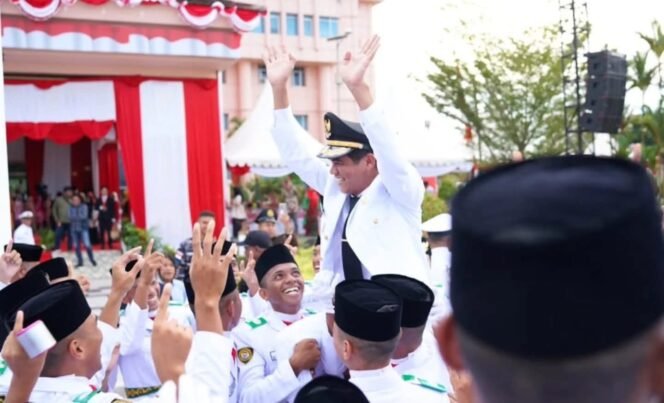 
					Perayaan tuntasnya tugas Paskibra Nunukan mengibarkan dan menurunkan Bendera Merah Putih pada Upacara HUT 80 RI, Minggu (17/8/2025). Dok.Prokopim.
