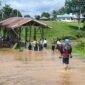 Dua sungai di Krayan, Sungai Pa' Lulut dan Sungai Pa' Bawan meluap, sebabkan banjir yang menggenangi akses jalan utama. Anak anak sekolah diliburkan. Dok.BPBD Nunukan.