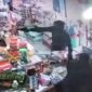 Tangkapan layar CCTV dari sebuah aksi perampokan di sebuah Toko Sembako di Jalan Jenderal Sudirman, Desa Sei Manurung, Sebatik. 