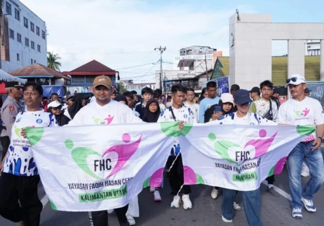 
					Gerak jalan dalam peringatan hari autis sedunia 2026, para penyandang disabilitas juga dibagi kartu untuk mendapat pelayanan umum tanpa diskriminasi. Dok.Prokopim.