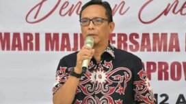 Pj. Sekretaris Daerah Kabupaten Nunukan, Raden Iwan Kurniawan membuka Rapat Kerja KONI Kabupaten Nunukan Tahun 2026, di Cafe Sayn, Minggu (12/4/26). Dok.Prokopim Nunukan.