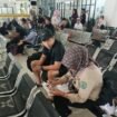 Petugas BPS Nunukan saat wawancara salah seorang Wisman di Pelabuhan Tunon Taka, Nunukan. Dok.BPS Nunukan.