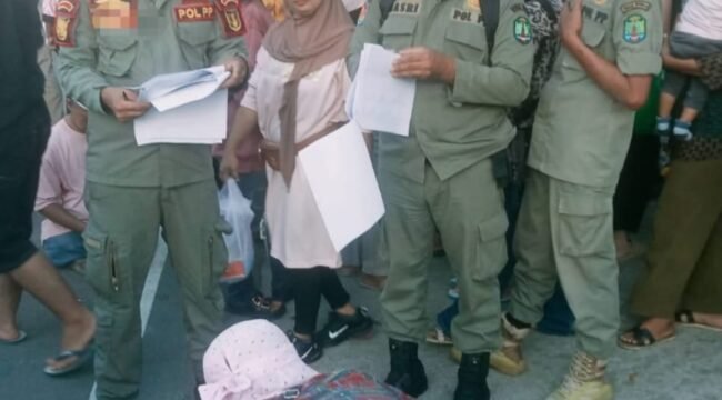 Keterlibatan Anggota Satpol PP, HA saat sosialisasi RTH bagi pedagang di alun alun Nunukan, menjadi sorotan masyarakat.