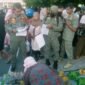 Keterlibatan Anggota Satpol PP, HA saat sosialisasi RTH bagi pedagang di alun alun Nunukan, menjadi sorotan masyarakat.