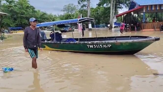 
					Banjir di areal patok batas negara di Aji Kuning, Pulau Sebatik. Dok.Aris nur.